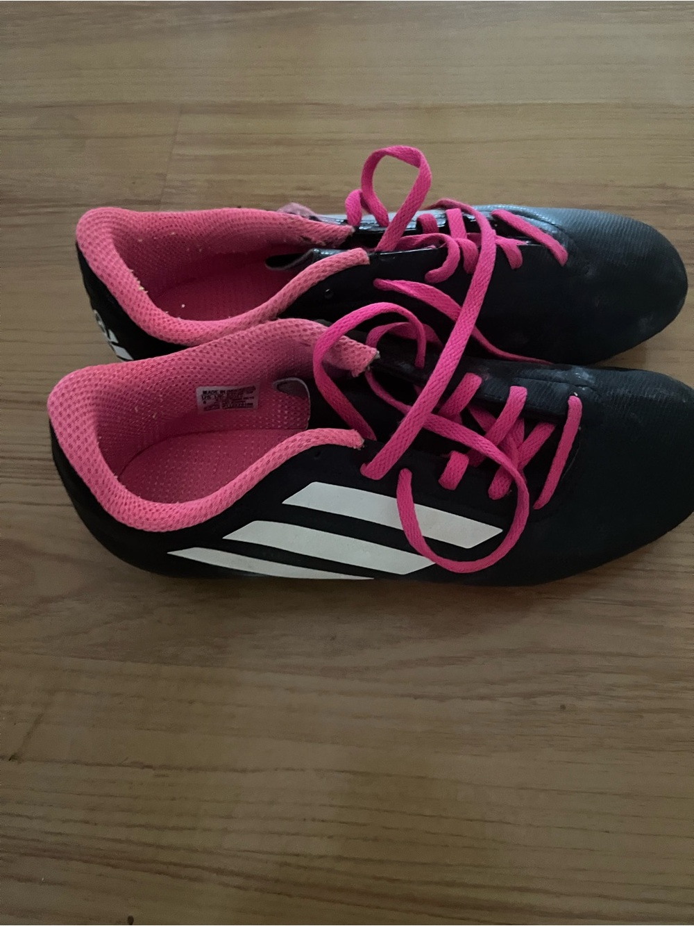 adidas women/ girls black and pink cleats